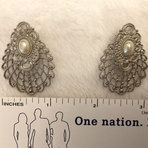 Lovely filigree style silver tone earrings